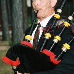 Bagpipe player performing at a wedding