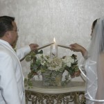 Lighting the unity candle during the ceremony