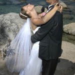 The bride dips her head backwards