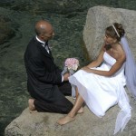 A romantic moment by the lake for the married couple