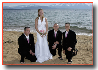 Bride on the beachfront with groomsmen